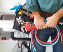 plumber with tools